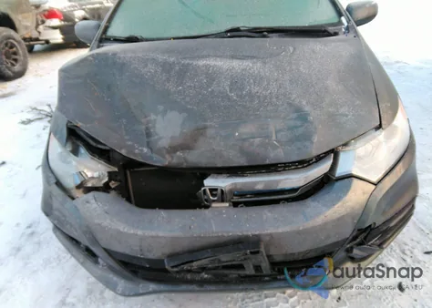 2012 Honda Insight Lx z USA, uszkodzony, nr VIN JHMZE2H53CS001624